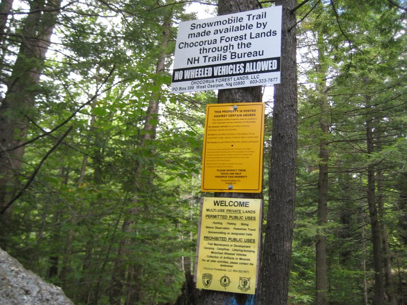 MtBayle (7).JPG - About half way down the ski mobile trail was this sign post full of warnings.